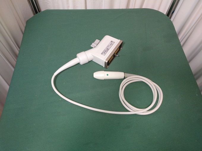 a probe on top of a green table