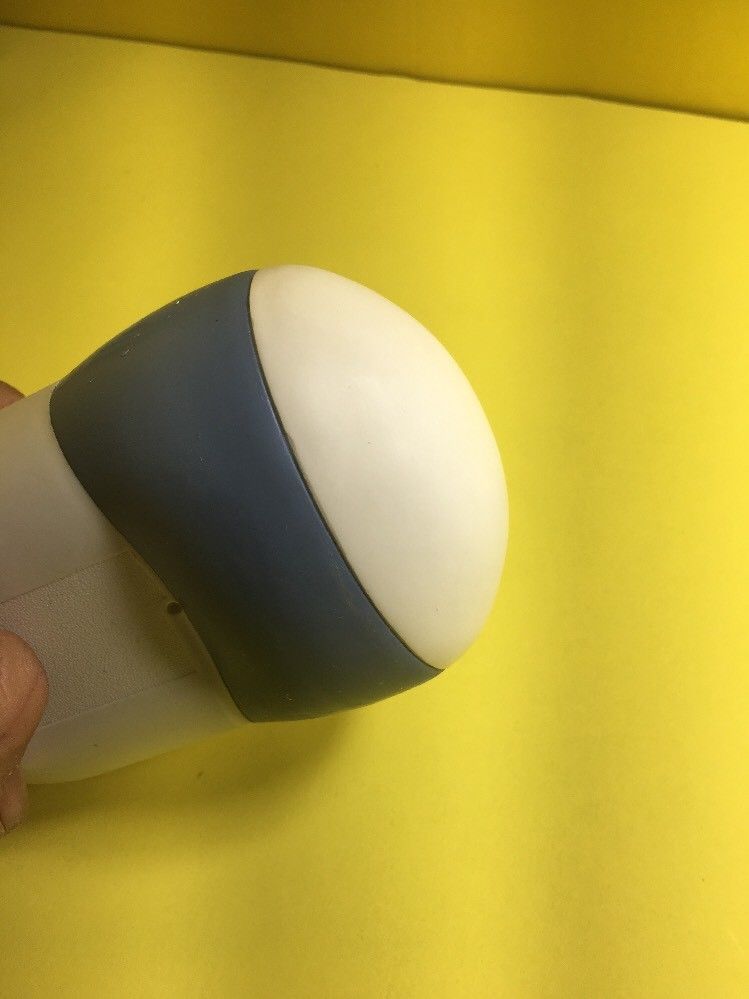 close up of probe head with yellow background