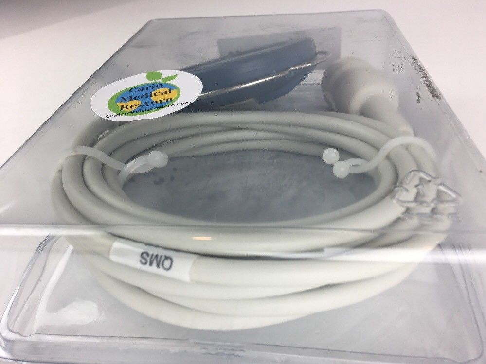a white cord in a clear plastic box
