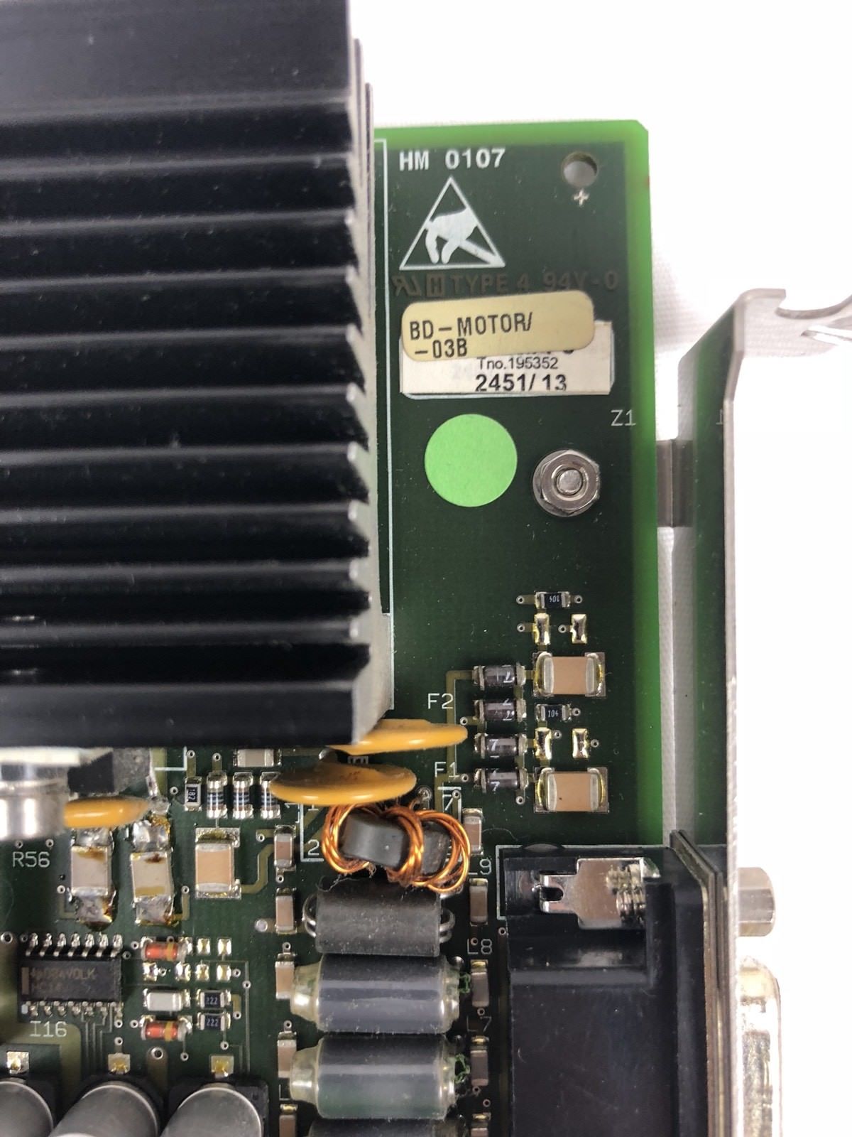 a close up of a computer motherboard with many wires