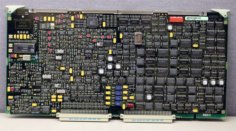 a close up of a computer board with many electronic components