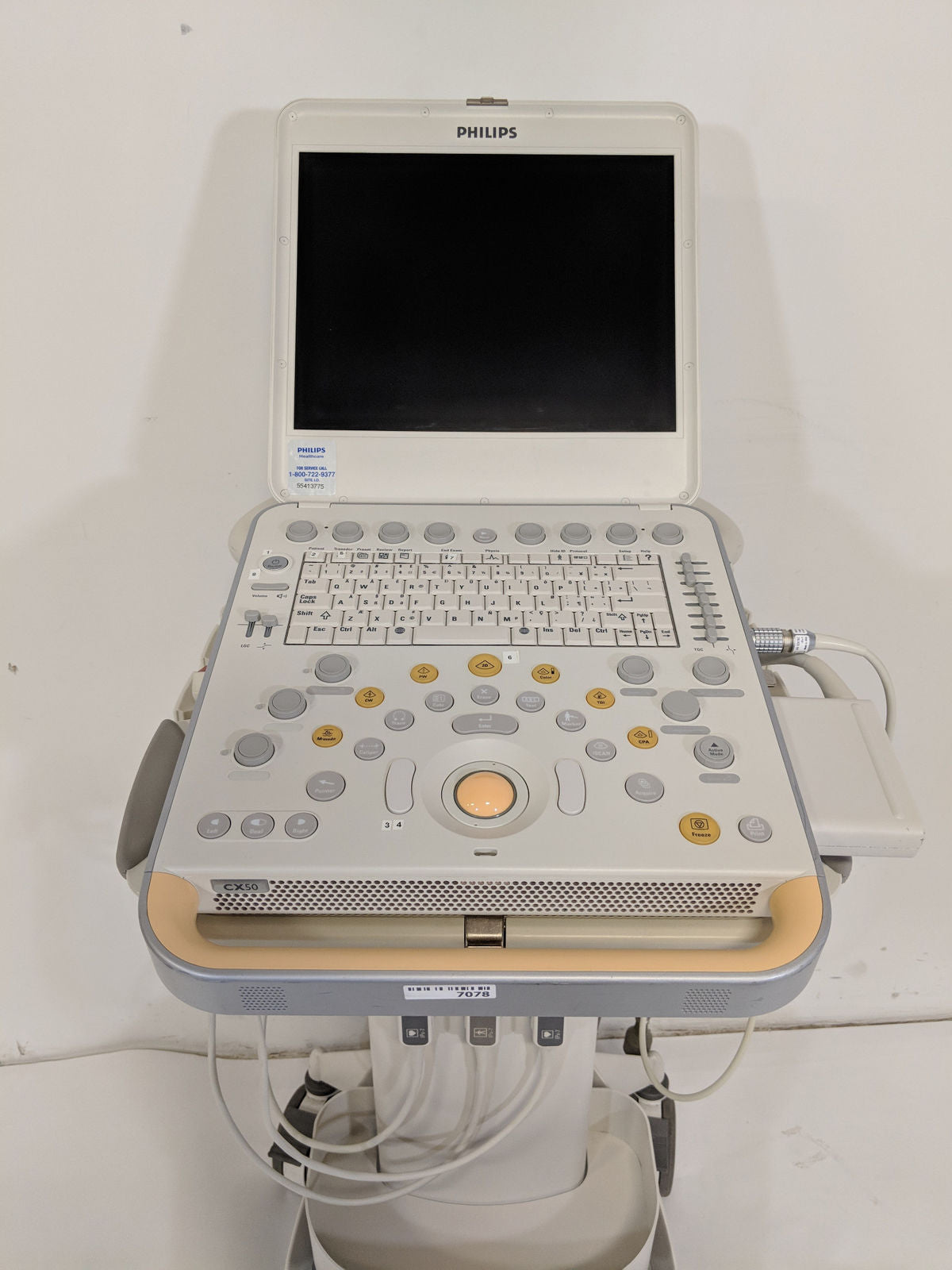 a laptop computer sitting on top of a table