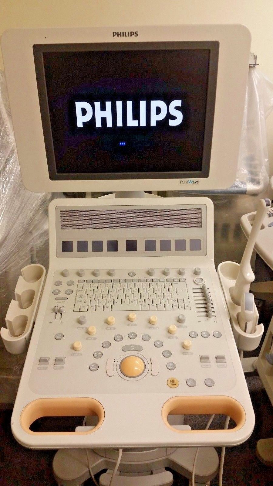 a laptop computer sitting on top of a table