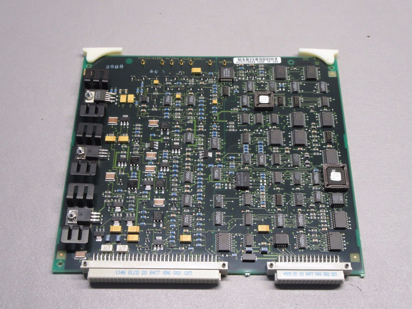 a close up of a computer board with many electronic components