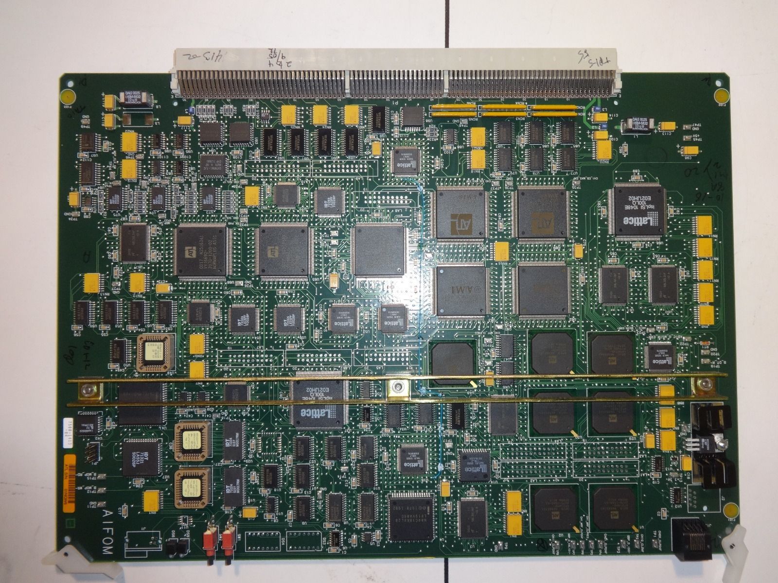 a close up of a computer board with many components