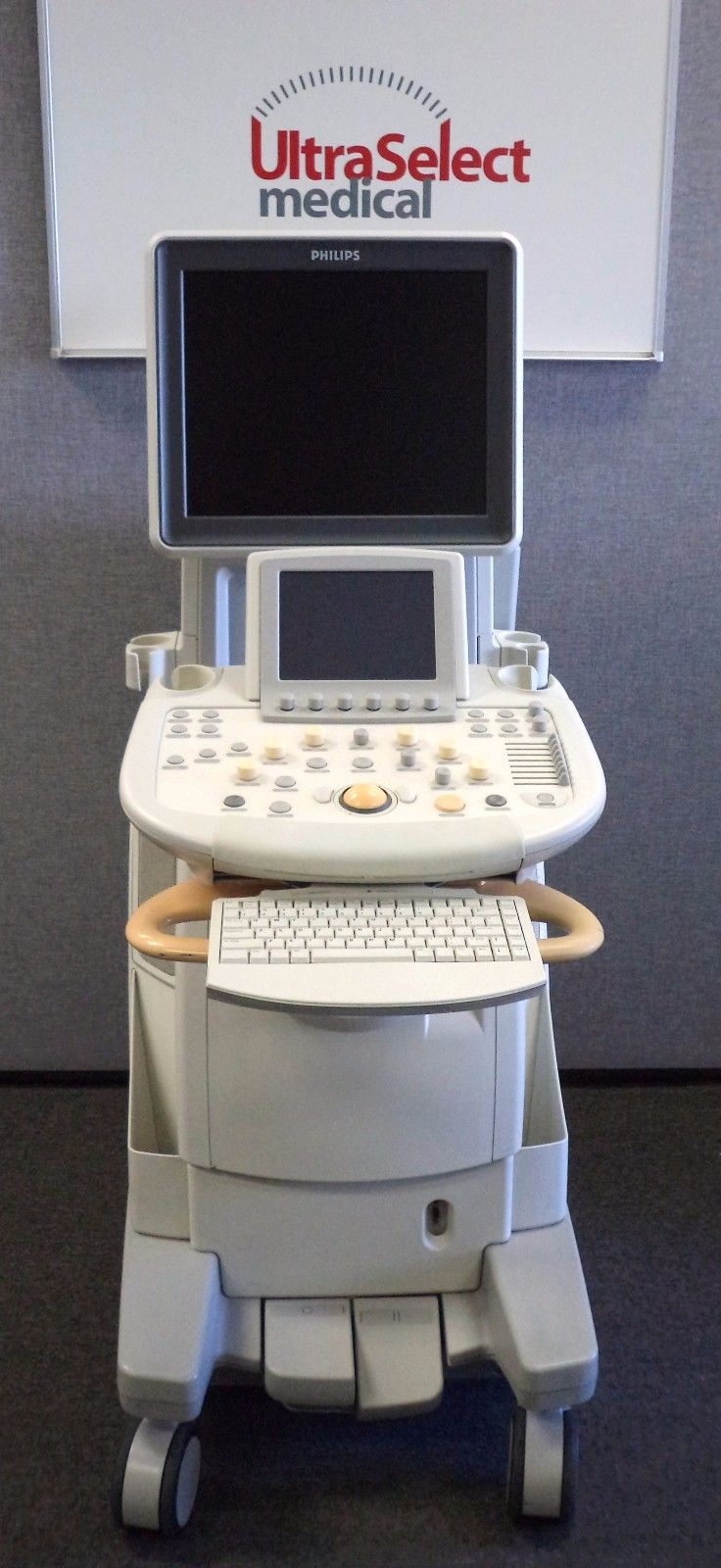 a medical machine with a monitor on top of it