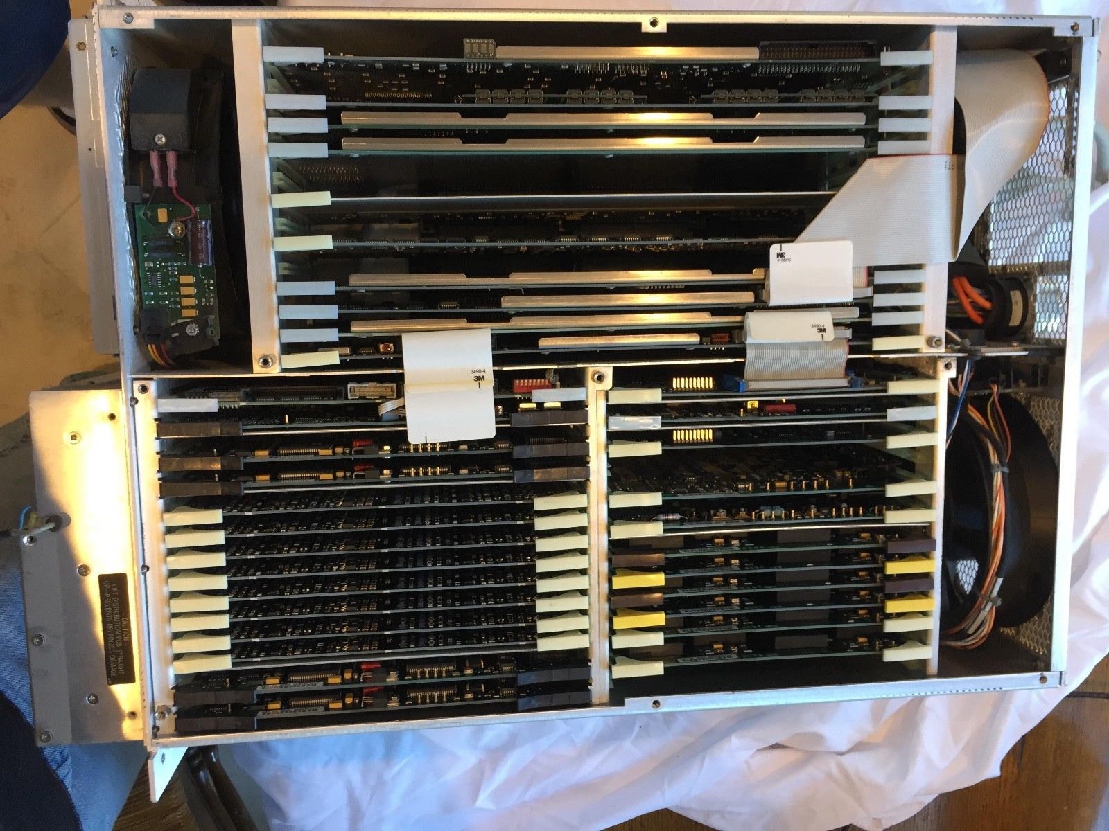 a rack of electronic equipment sitting on top of a table