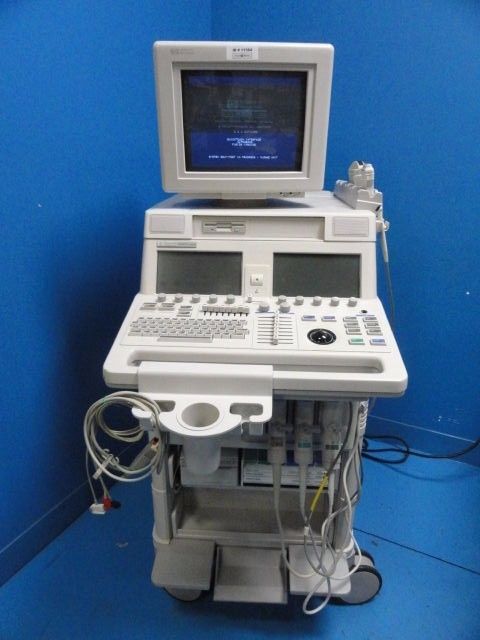 a medical machine with a monitor on top of it