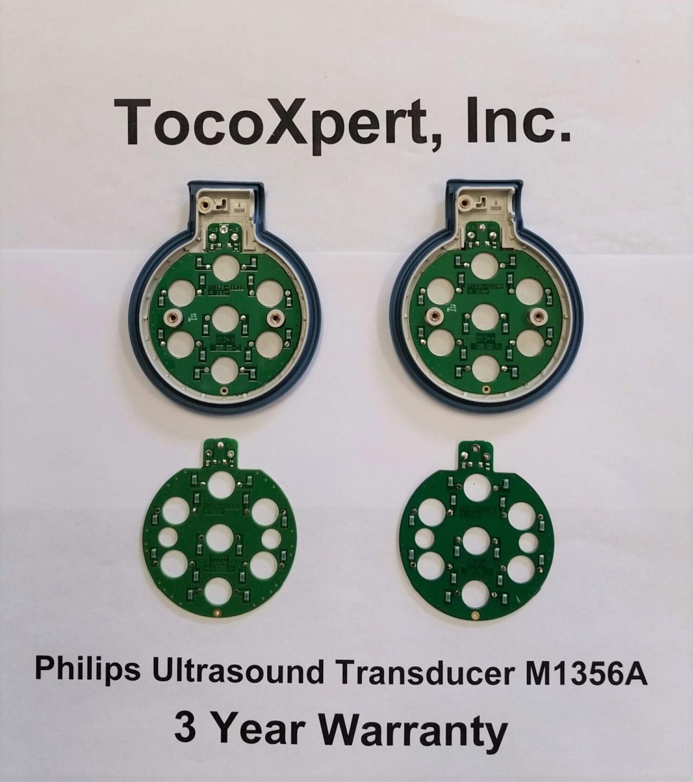 a pair of green and white buttons on top of a white sign