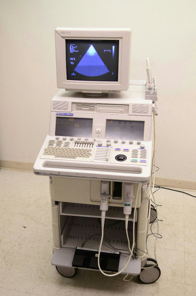 a medical machine with a monitor on top of it