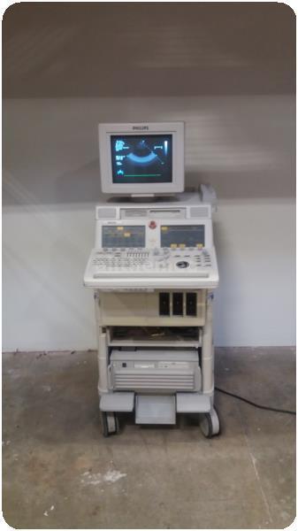 a computer monitor sitting on top of a desk