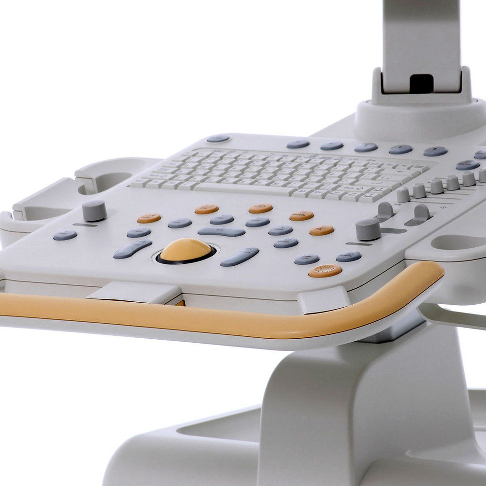 a computer keyboard sitting on top of a white desk