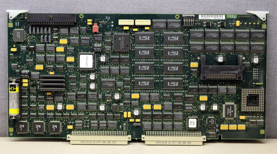 a close up of a computer board with many components