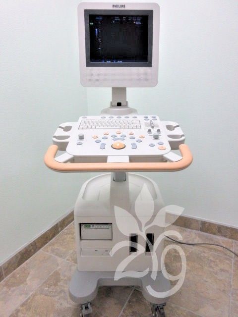 a computer monitor sitting on top of a table