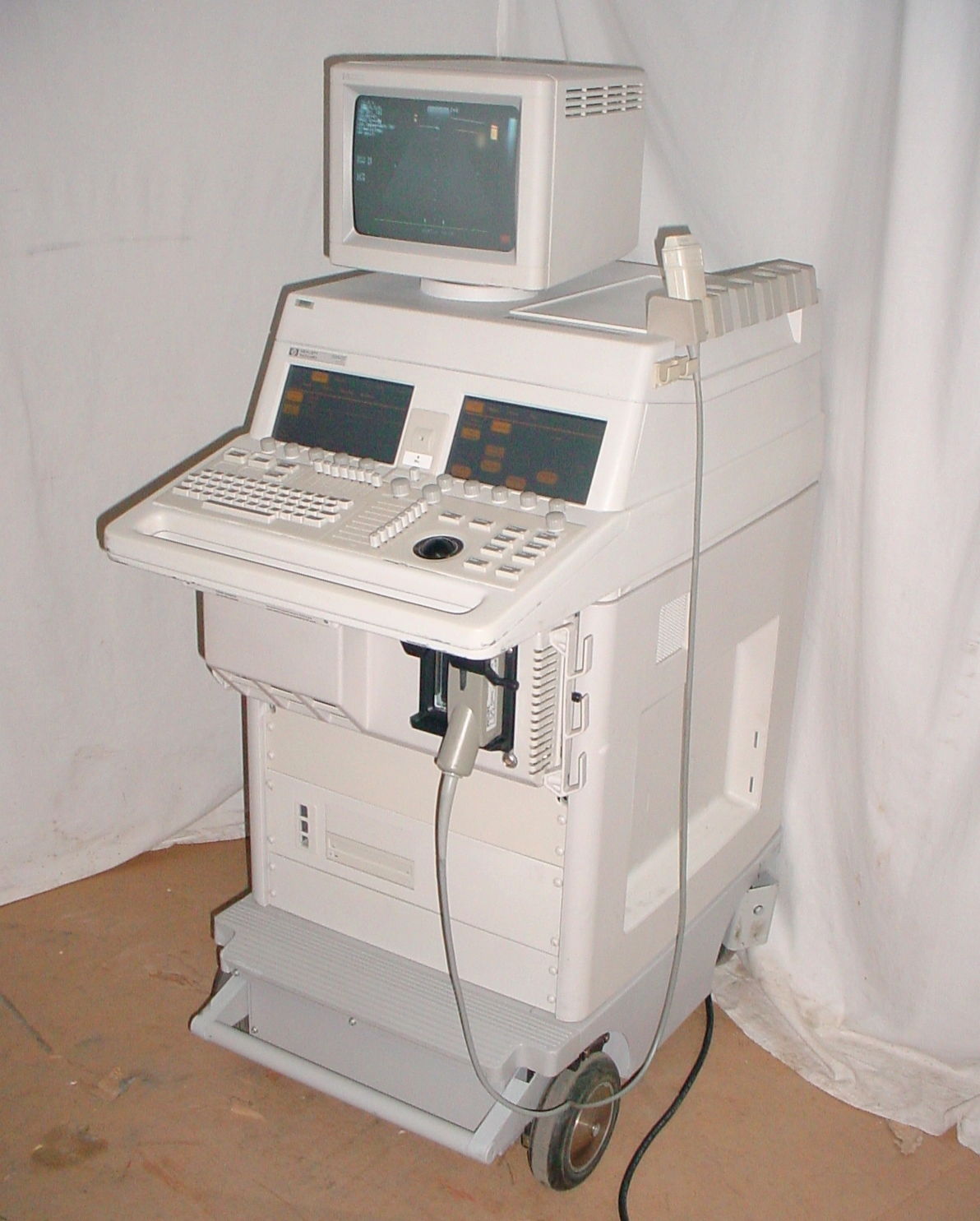 a computer that is sitting on top of a cart