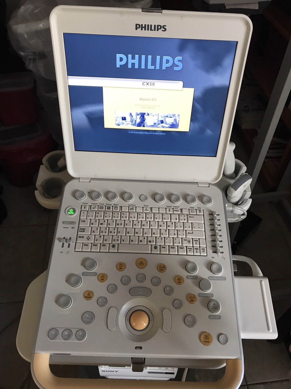 a laptop computer sitting on top of a table