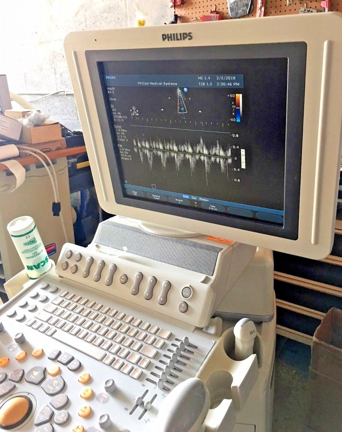 a computer monitor sitting on top of a desk