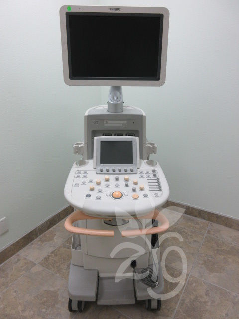 a medical machine with a monitor on top of it