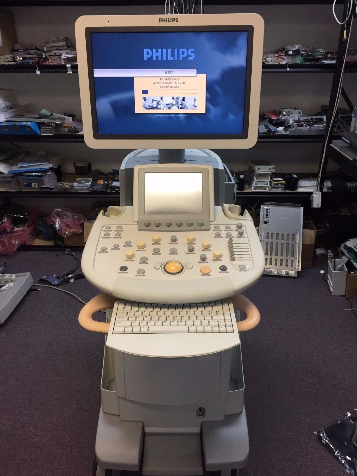 a computer monitor sitting on top of a desk