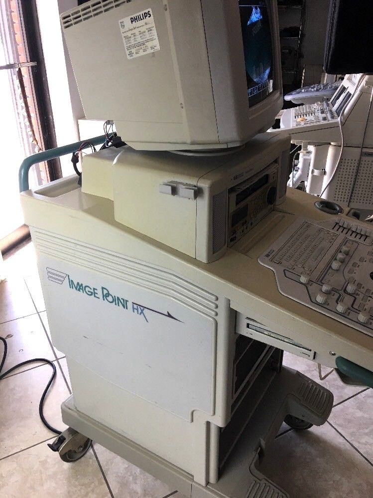 a computer sitting on top of a computer desk