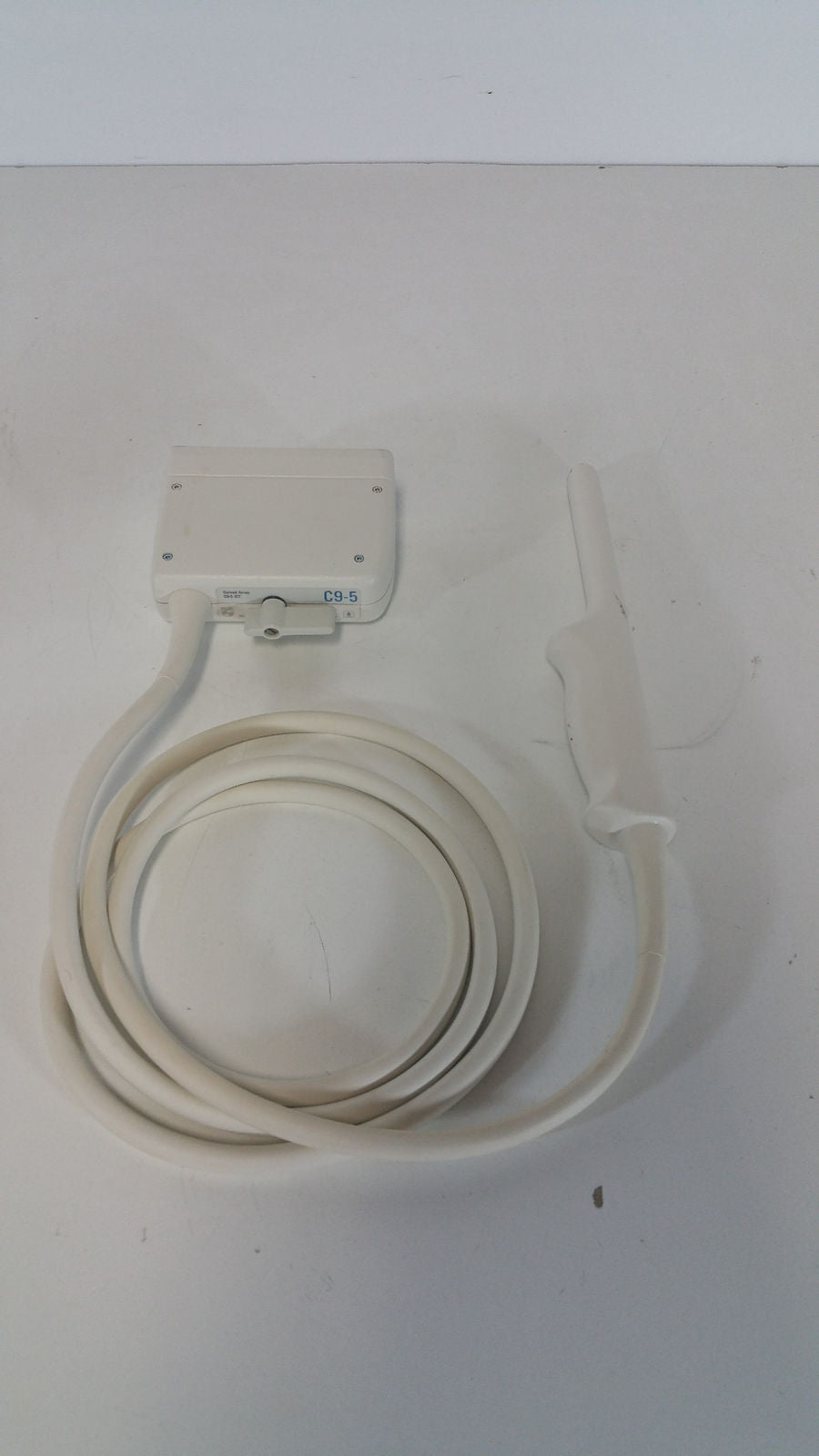 white probe device on a table