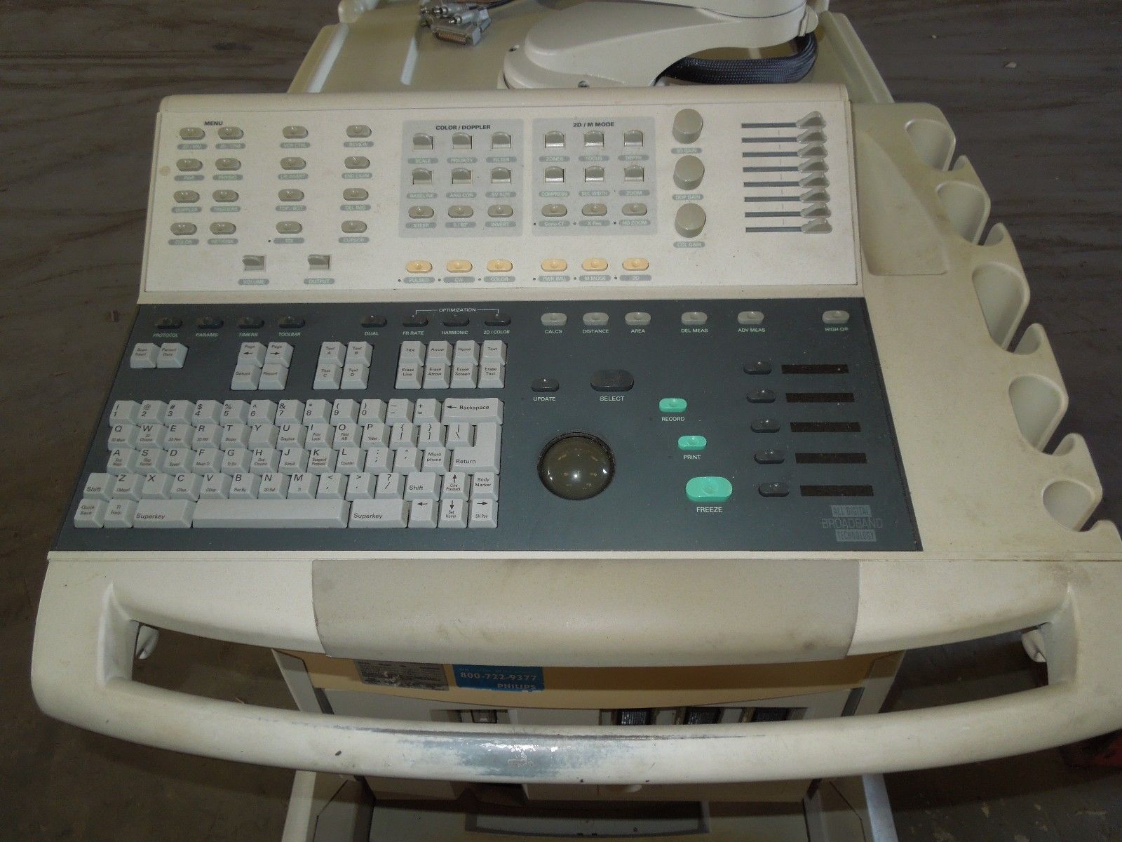 a computer keyboard sitting on top of a table