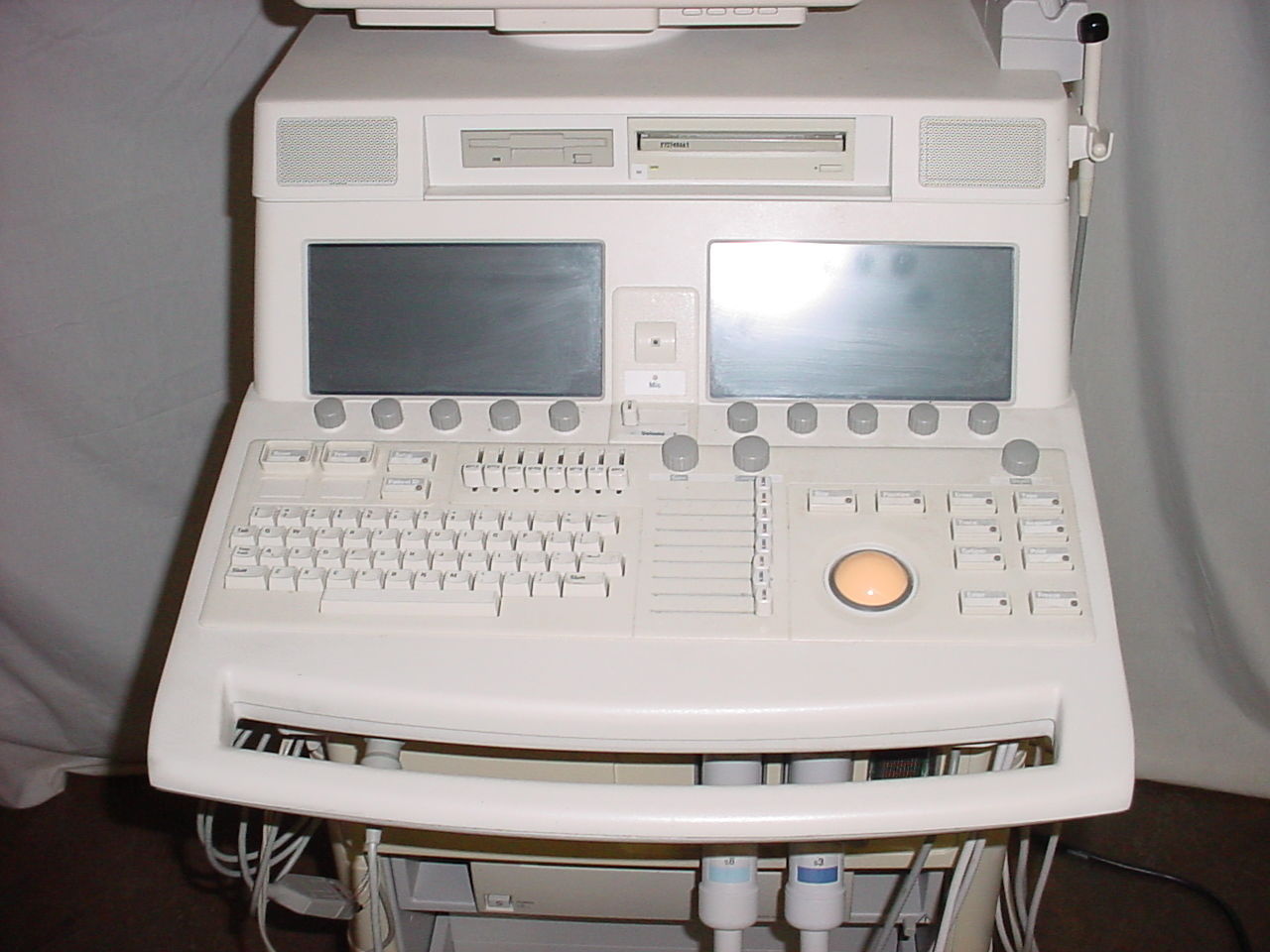 a white computer sitting on top of a table