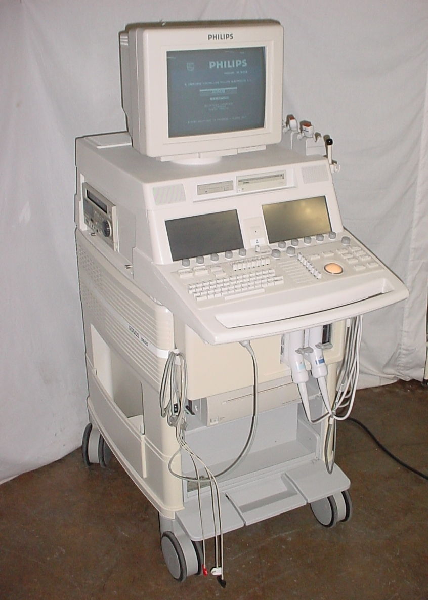 a computer sitting on top of a cart