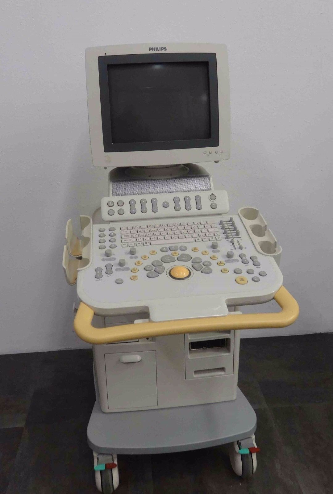 a computer sitting on top of a cart