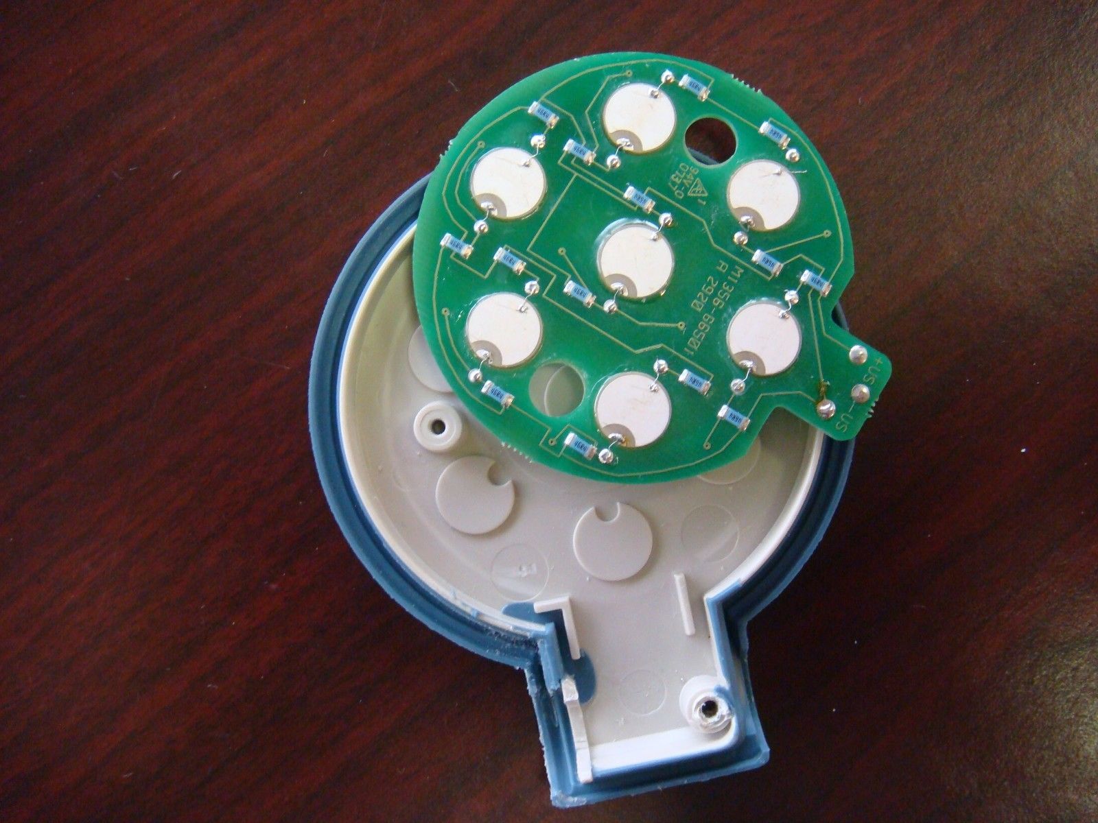 green item on wood desk