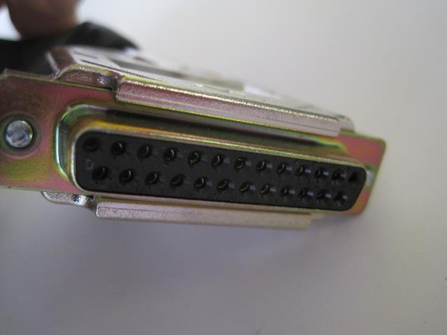 a close up of a person holding a metal device