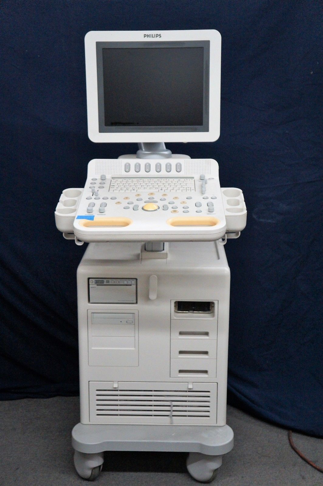 a medical machine with a monitor on top of it