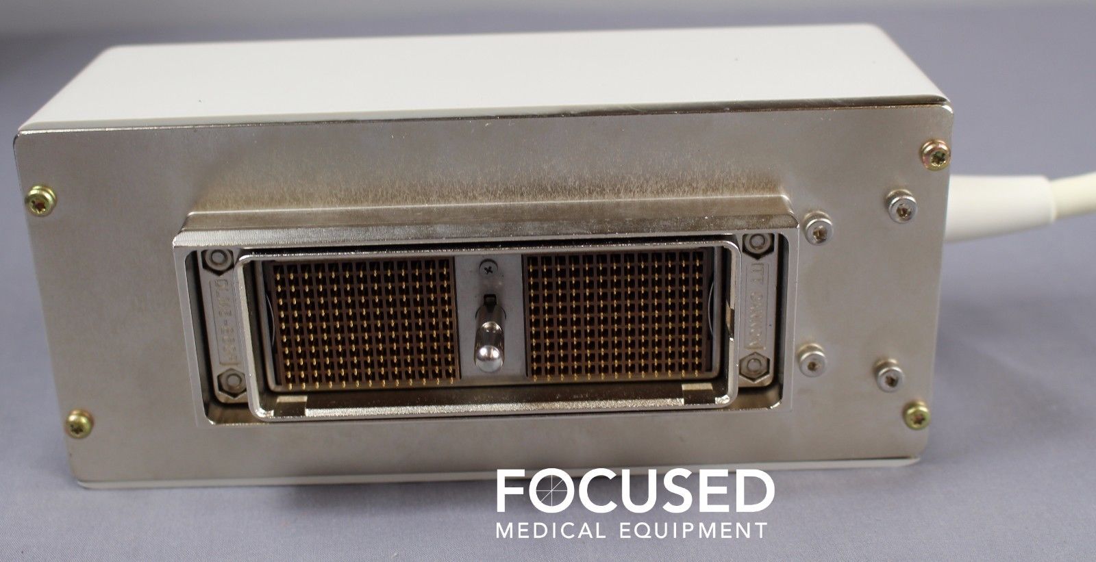 a close up of a probe with a white cord